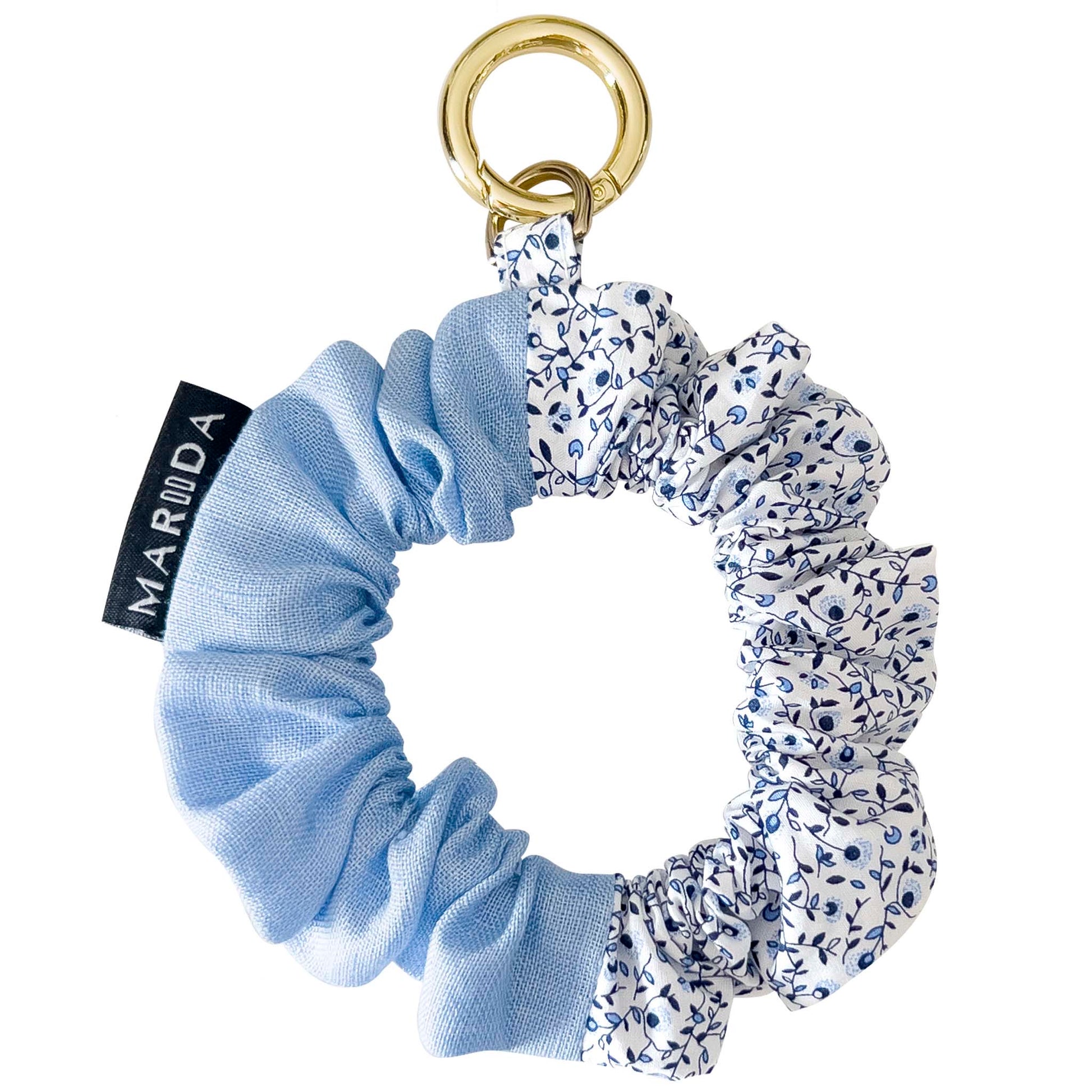 Scrunchie midi travel in tessuto riciclato azzurro e bianco con fiori blu